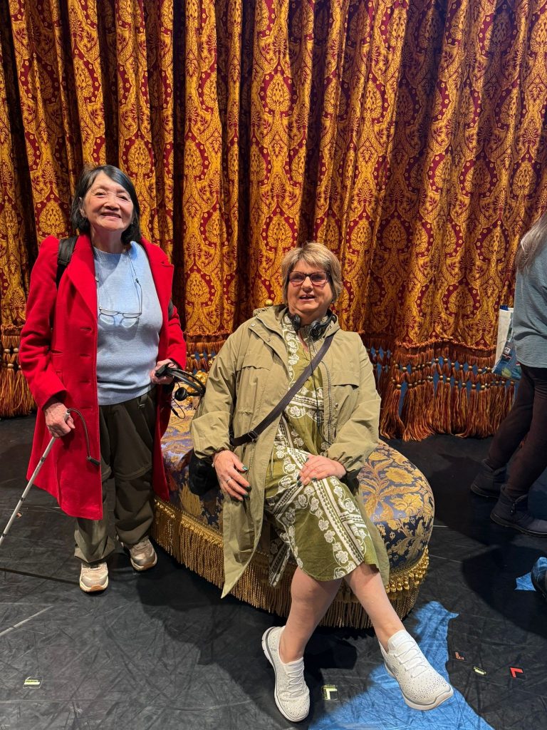 Relaxing on a chaise longue on set